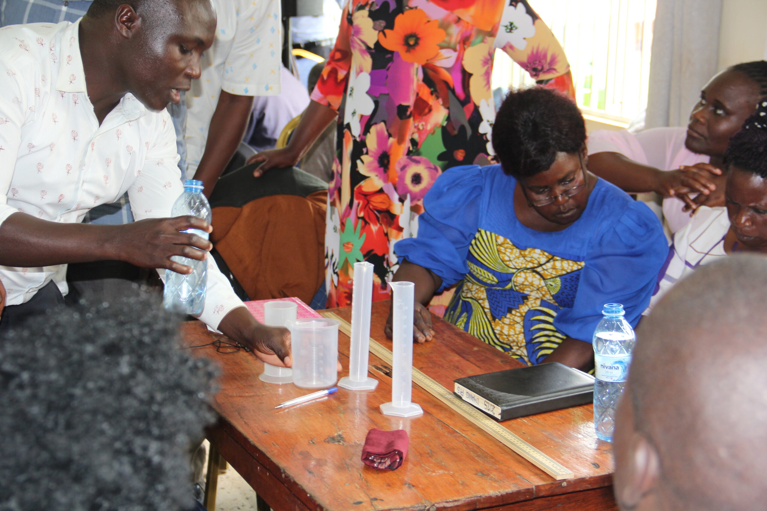Teacher leading a practical lesson
